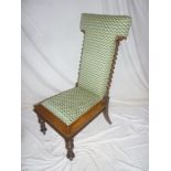 A Victorian rosewood prayer chair with upholstered seat and back,