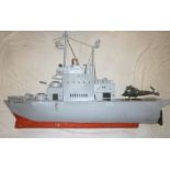 A large painted metal model of the French warship Mistral 53" long overall