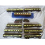 A kit-built OO gauge GWR City of Truro locomotive and tender and eight various GWR coaches,