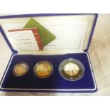 A 2003 silver proof Piedfort three-coin set,