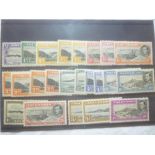 A set of twenty-three Ascension Islands 1938 stamps including extra perf varieties