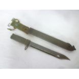 A German long-version M16 bayonet with single-edged saw back blade in scabbard with webbing frog