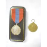 An Imperial Service medal (EIIR) awarded to John George Charles Avery,