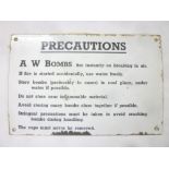 A Second War enamelled rectangular 'precautions' sign "AW Bombs fire instantly on breaking in air...