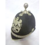 A Victorian Officer's blue cloth helmet of the 1st Cornwall Artillery Volunteers with silver-plated