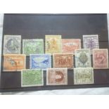 A part set of thirteen Newfoundland 1933 stamps (minus 7c)