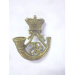 A Victorian brass Glengarry badge of the 32nd (Cornwall) Light Infantry