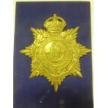 A brass back pack/valise badge of the Duke of Cornwall's Light Infantry