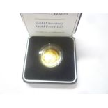 A 2000 Guernsey gold proof £25 coin,