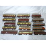 Triang OO gauge three various diesel locomotives and a selection of various carriages