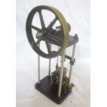 A scale built model vertical beam engine with fly-wheel