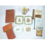 A selection of Boer War related items including a pair of china rectangular wall plaques with