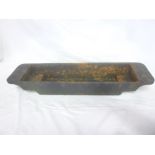 A 19th Century Cornish cast iron stepped mould for a tin ingot,