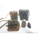 A pair of X8 Extrolate binoculars by Beck of London in leather carrying case;