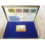 A 1977 Silver Jubilee commemorative sterling silver ingot by Danbury Mint complete with relating