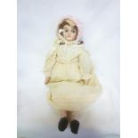 An old French porcelain headed doll by Limoges,