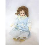 A German porcelain headed doll, the head marked "Made in Germany 132-15 D.E.P.