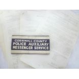 A Second War linen arm band "Cornwall County Police Auxiliary Messenger Service" together with a