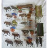 A selection of Britains Ltd and other horse-drawn farm carts, wagons, hay-rake,