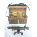 A good quality suveryors theodolite by Troughton & Simms of London in fitted wooden case and