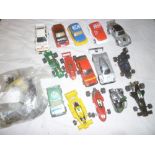 A selection of Scalextric racing cars and accessories