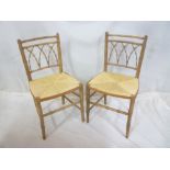 A pair of 19th Century beechwood bamboo effect occasional chairs with rushwork seats on turned legs