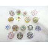 Sixteen various glass paperweights including Strathearn, Deacons, Manson and others,