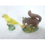 A 19th Century china trinket jar and cover in the form of a squirrel and one other china bird