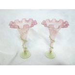 A pair of Victorian glass tapered vases with pink tinted foliate rims and spiral twist stems