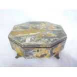 An old Eastern style lacquered games box with landscape decoration on paw feet containing various