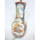 A 19th Century Japanese pottery tapered vase with painted figure and landscape decoration, 20" high,