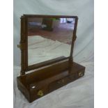 A 19th Century mahogany rectangular swing toilet mirror on turned supports,