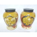 A pair of 19th Century painted stoneware tobacco jars "Fine Cut Cavendish/Mixture" with metal