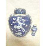 A large 19th Century Chinese circular gift jar and cover with blossoming decoration,