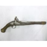 An 18th Century French flintlock holster pistol with 11" steel barrel, engraved steel lock,