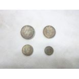 A Victorian 1873 silver four piece maundy coin set in later case