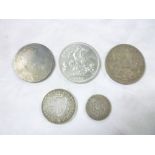 A Victorian 1891 silver half crown, 1899 shilling, two crowns 1935 and 1951,