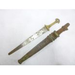 An old tribal dagger with 12" double-edged steel blade,