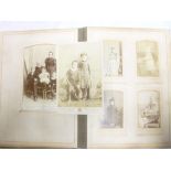 A Victorian family photograph album of carte de visites and cabinet photographs,