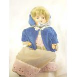 A German porcelain headed doll, the head marked "Made In Germany 110 121 5/0",