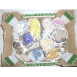 A box of various World minerals including sulphur, azurite, celestite,