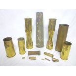 A selection of First and Second War brass shell cases including a pair of First War trench-art