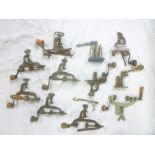 A collection of eleven various old cartridge reloading tools including roll turnover tools,