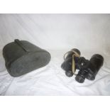 A pair of US Navy 7X50 binoculars in carrying case