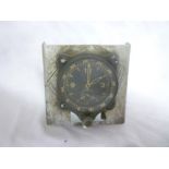 A Second War German aircraft clock in aluminium mount