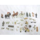 A small selection of various Britain's painted lead farm animals and figures together with a small