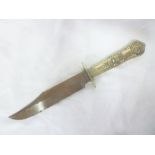 A 19th Century Bowie knife by Wilson of Sheffield with 6" single edged blade and decorated nickel