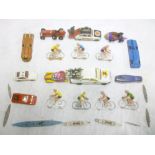 Two Corgi toys Tour de France vehicles together with cyclists,