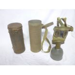 A Second War German military gas mask in original canister and a German steel gas mask canister (2)