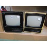 Two vintage Mitsubishi portable televisions